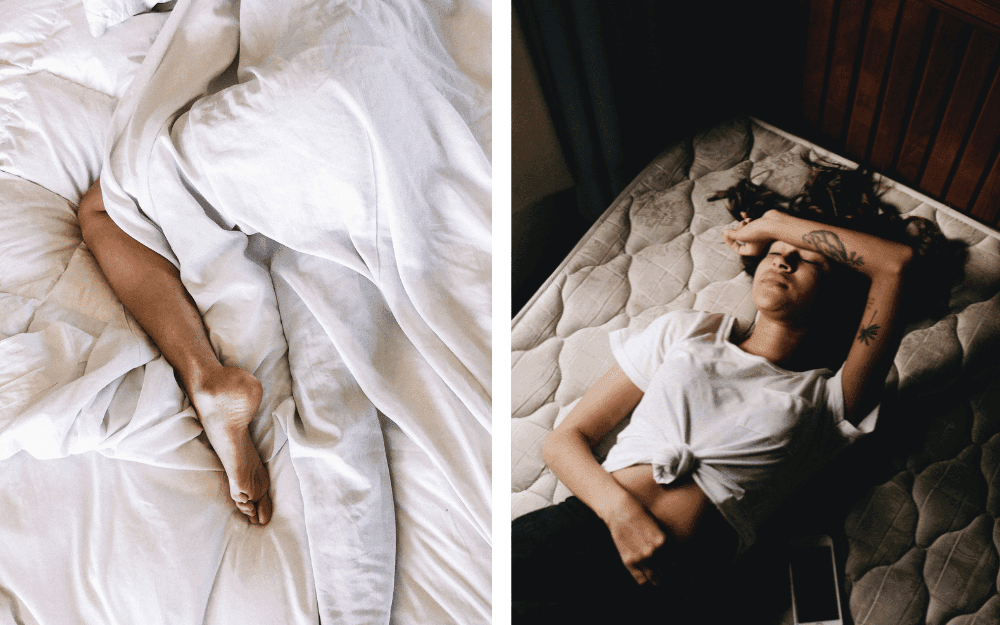 Kvinnoben sticker upp mellan vita lakan i en säng. Mörkhårig kvinna med ligger med armen mot pannan på en madrass.