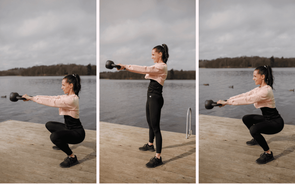 Kvinna står på brygga och tränar knäböjspress hel swing med kettlebell.